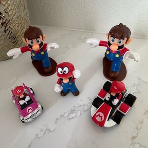 Super Mario Action Figures and Cars Collectibles Sold as set of 5.